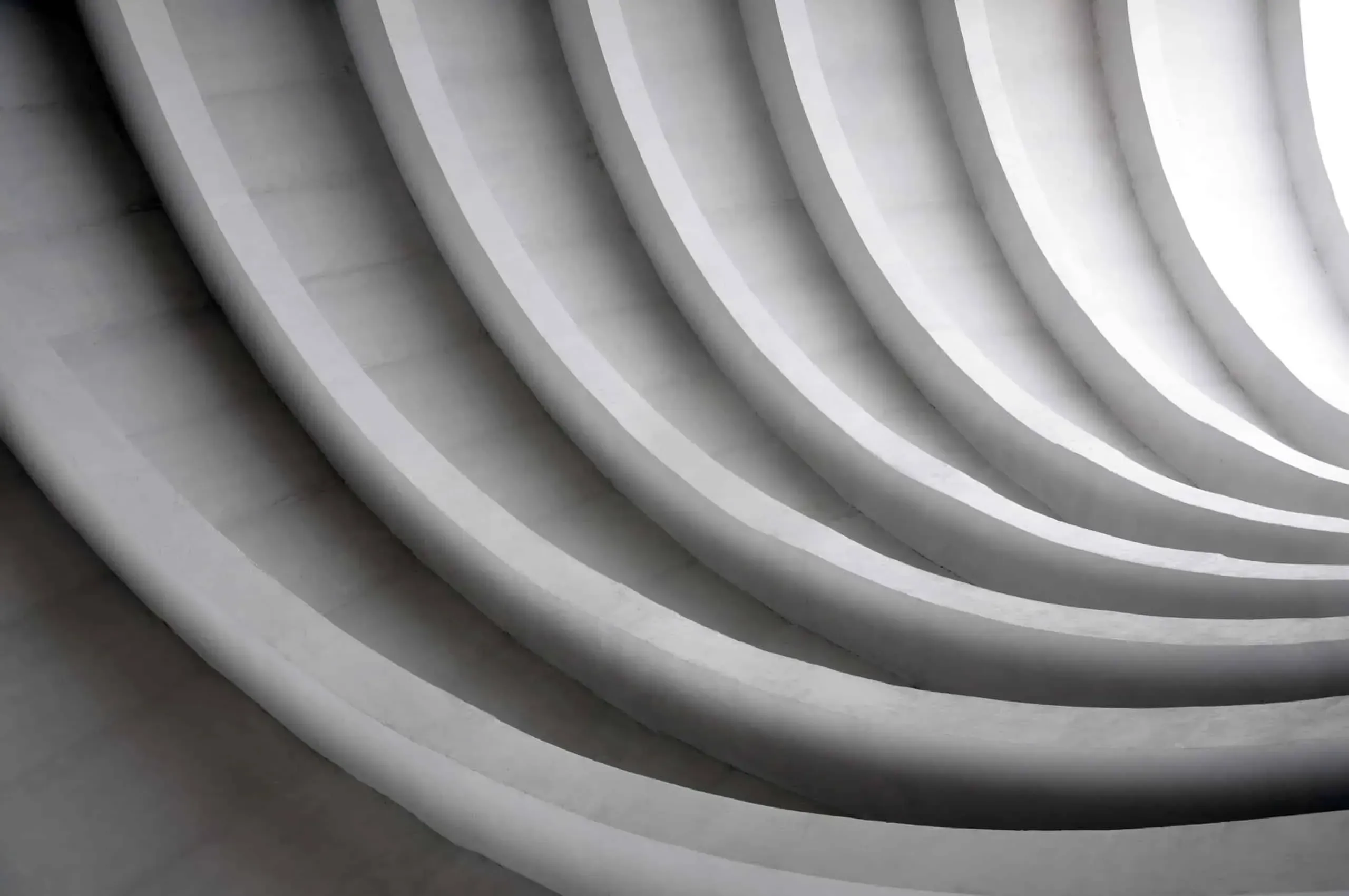 Curved White Architectural Structure - 1031 Luxury Exchange