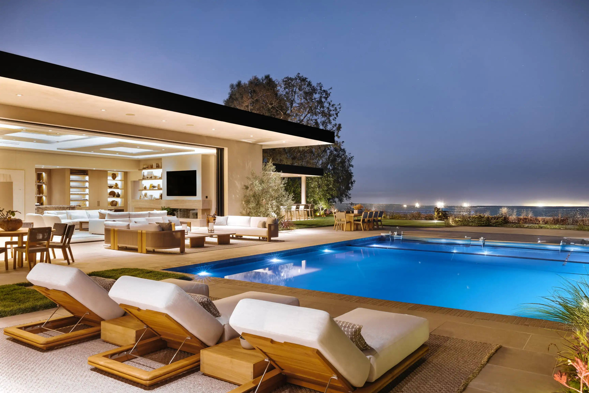 Luxury House With Pool At Night - 1031 Luxury Exchange
